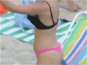 pinkish swimsuit amateur without bra voyeur Beach chicks