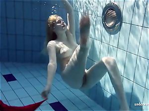 scorching blond Lucie French teenager in the pool